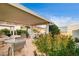 Relaxing patio with seating area, tile flooring, and mountain views at 408 Matecumbe Way, Boulder City, NV 89005