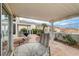 Spacious patio with seating, a grill, and mountain views at 408 Matecumbe Way, Boulder City, NV 89005