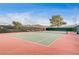 Clean tennis court with mountain backdrop at 408 Matecumbe Way, Boulder City, NV 89005