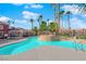 Community swimming pool with surrounding landscaping at 4730 E Craig Rd # 2158, Las Vegas, NV 89115