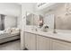 Bright bathroom with double sinks and a view of the bedroom at 5370 Cholla Cactus Ave, Las Vegas, NV 89141