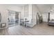 Kitchen nook with round table and chairs leading to patio at 5370 Cholla Cactus Ave, Las Vegas, NV 89141