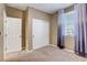 Spacious bedroom with double door closet and window coverings at 5805 Vibrant Violet Ct, Las Vegas, NV 89130