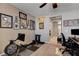 Home office with a rowing machine and desk at 5805 Vibrant Violet Ct, Las Vegas, NV 89130