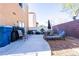 Backyard with patio, lounge chairs, and grill at 6074 Lazarro Ct, Las Vegas, NV 89139