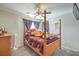 Charming bedroom with a full-size bed and a ceiling fan at 6228 Wood Stork Ave, Las Vegas, NV 89122