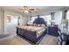 Spacious main bedroom with dark wood furniture and ceiling fan at 6228 Wood Stork Ave, Las Vegas, NV 89122