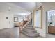 Elegant staircase with a large gold framed mirror at 6228 Wood Stork Ave, Las Vegas, NV 89122