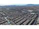 Wide aerial view of community near mountains and amenities at 6641 Hurkling Stone Ave, Las Vegas, NV 89139