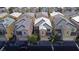 Aerial view of townhouses with tile roofs and garages at 6641 Hurkling Stone Ave, Las Vegas, NV 89139