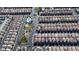 Aerial view showing community pool, playground, and numerous houses at 6641 Hurkling Stone Ave, Las Vegas, NV 89139