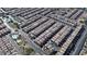 Aerial view of community with pool and many houses at 6641 Hurkling Stone Ave, Las Vegas, NV 89139