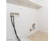 Simple laundry room with hookups and shelving at 6641 Hurkling Stone Ave, Las Vegas, NV 89139