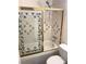 Bathroom with shower/tub combo and decorative tile at 730 S Royal Crest Cir # 445, Las Vegas, NV 89169