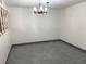 Empty dining room with granite floors and chandelier at 730 S Royal Crest Cir # 445, Las Vegas, NV 89169