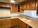 Kitchen with wood cabinets and stainless steel appliances at 730 S Royal Crest Cir # 445, Las Vegas, NV 89169