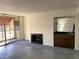 Living room features a fireplace, wet bar, and access to a balcony at 730 S Royal Crest Cir # 445, Las Vegas, NV 89169