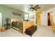 Main bedroom with ceiling fan and large closet at 7317 Wild Roar Ave, Las Vegas, NV 89129