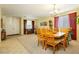 Bright dining room featuring a wooden table and chairs at 7317 Wild Roar Ave, Las Vegas, NV 89129