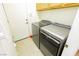 Convenient laundry room with front-load washer and dryer at 7317 Wild Roar Ave, Las Vegas, NV 89129