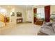 Living room with a view of the entryway and staircase at 7317 Wild Roar Ave, Las Vegas, NV 89129