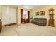 Spacious living room with a comfortable couch and large windows at 7317 Wild Roar Ave, Las Vegas, NV 89129