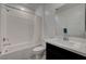 Clean bathroom with a shower/tub combo and dark vanity at 7336 N Decatur Blvd # 2, Las Vegas, NV 89131