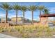 Valley Vista community entrance with palm trees and signage at 7336 N Decatur Blvd # 2, Las Vegas, NV 89131