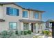 Two-story house with gray siding and landscaping at 7336 N Decatur Blvd # 2, Las Vegas, NV 89131