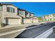 Townhome complex showcasing multiple units and parking at 7336 N Decatur Blvd # 2, Las Vegas, NV 89131