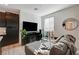 Living room with gray sectional sofa and a glass coffee table at 7336 N Decatur Blvd # 2, Las Vegas, NV 89131