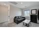 Upstairs loft area with gray couch and a marble top coffee table at 7336 N Decatur Blvd # 2, Las Vegas, NV 89131