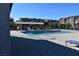 Community pool with a shaded seating area at 7336 N Decatur Blvd # 2, Las Vegas, NV 89131