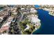 Aerial view of community lake, beach, and clubhouse at 7608 Sea Wind Dr, Las Vegas, NV 89128