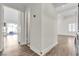 View of a hallway with wood-look flooring at 7608 Sea Wind Dr, Las Vegas, NV 89128