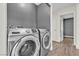 Bright laundry room, features washer and dryer at 7608 Sea Wind Dr, Las Vegas, NV 89128