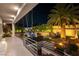 Night view of backyard with pool, patio, and built-in grill at 7880 Dana Point Ct, Las Vegas, NV 89117