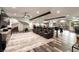 Basement entertainment area with theater seating, bar, and spiral staircase to the upper levels at 7880 Dana Point Ct, Las Vegas, NV 89117