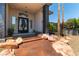 Modern entryway with double doors, stone accents, and a landscaped walkway at 7880 Dana Point Ct, Las Vegas, NV 89117