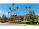 Exterior home view with palm trees, landscaping and blue sky at 7880 Dana Point Ct, Las Vegas, NV 89117