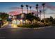 Night view of home's exterior, showcasing landscaping and modern design at 7880 Dana Point Ct, Las Vegas, NV 89117