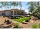 Two-story house exterior with landscaped yard and a large balcony at 7880 Dana Point Ct, Las Vegas, NV 89117