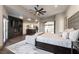 Elegant main bedroom with fireplace, TV, seating area, and ensuite bathroom access at 7880 Dana Point Ct, Las Vegas, NV 89117