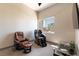 Relaxing office with massage chair and large window at 7880 Dana Point Ct, Las Vegas, NV 89117