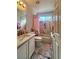 Clean bathroom with a shower/tub combo and updated vanity at 8116 Sedona Sunset Dr, Las Vegas, NV 89128