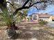 Single-story home with attractive landscaping and desert plants at 8116 Sedona Sunset Dr, Las Vegas, NV 89128