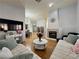 Open living space with hardwood floors, a fireplace, and seating area at 8116 Sedona Sunset Dr, Las Vegas, NV 89128