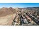 Aerial view of a residential neighborhood nestled against mountains at 816 Sandsprings St, Henderson, NV 89011