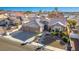 Aerial view of a single-Gathering home with a two-car garage and desert landscaping at 816 Sandsprings St, Henderson, NV 89011