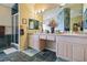 Double vanity bathroom with a walk-in shower and marble floors at 816 Sandsprings St, Henderson, NV 89011